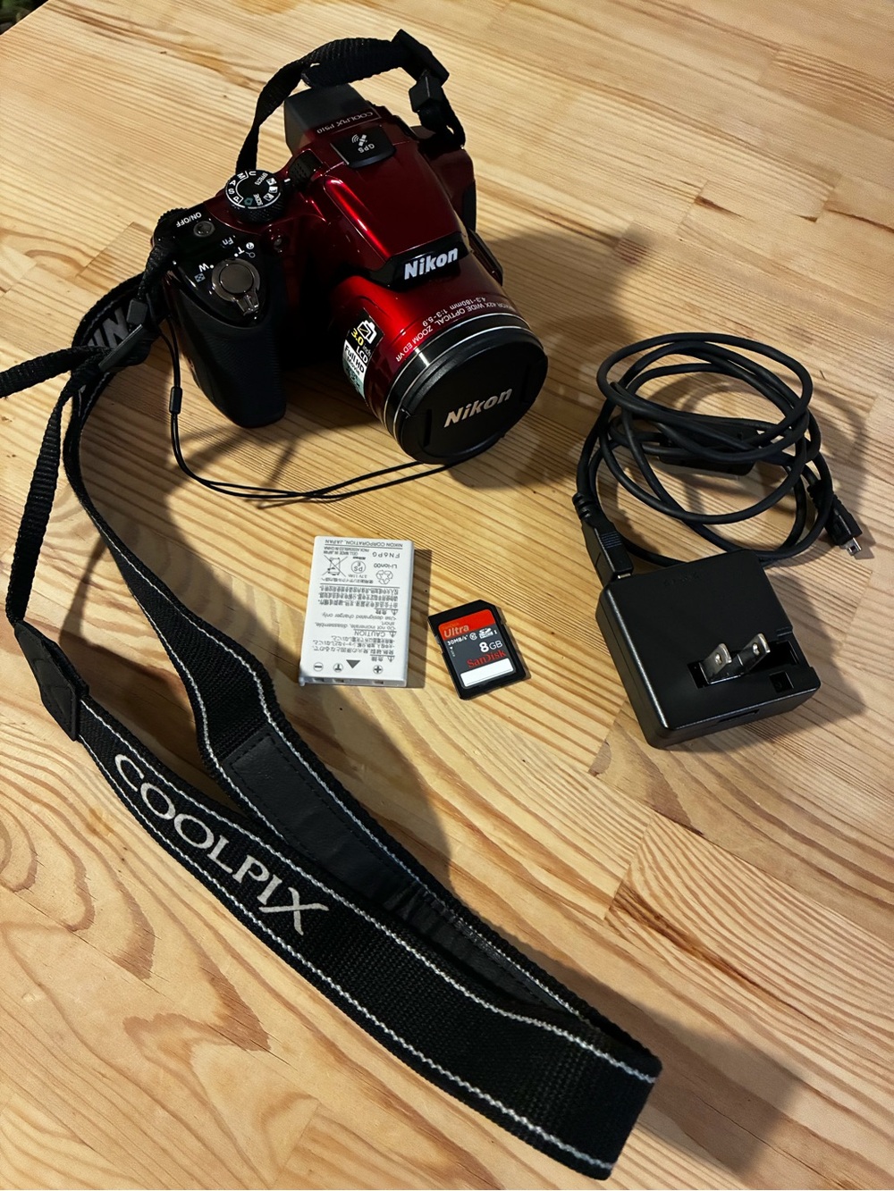 Nikon COOLPIX P510 Red Camera with Charger and 8GB Card. Bonus- red camera bag.